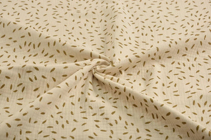 Motif petites feuilles en mousseline 125 g/m²