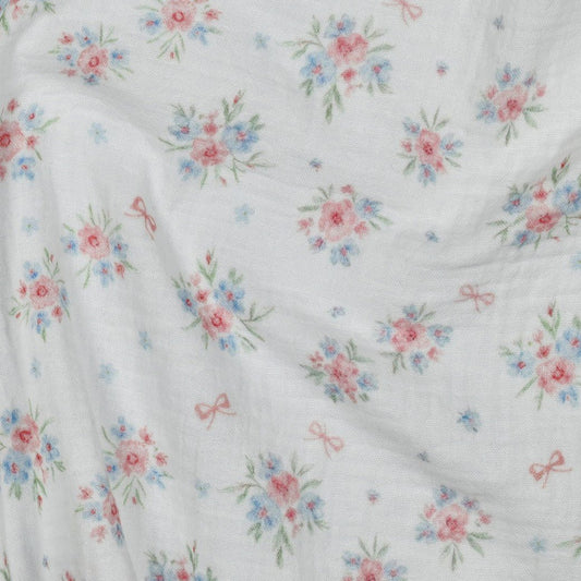 Attēls ar Muslīns - puķītes un bantes 120 g/m² – pieejams Šarlotes audumi