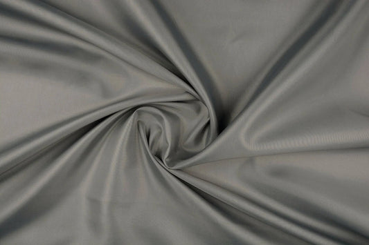 Attēls ar Oderes audums - pelēks 55 g/m² – pieejams Šarlotes audumi