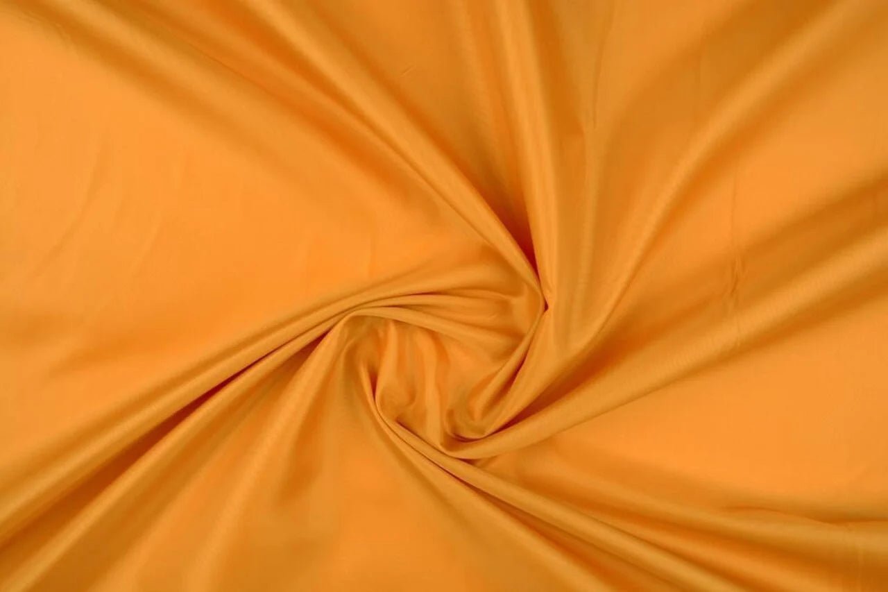 Attēls ar Oderes audums - tumši dzeltens 55 g/m² – pieejams Šarlotes audumi