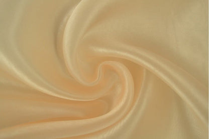 Organza - teinte pêche aérienne 25 g/m²