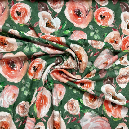 Jersey de coton fin - roses sur fond vert 200 g/m²