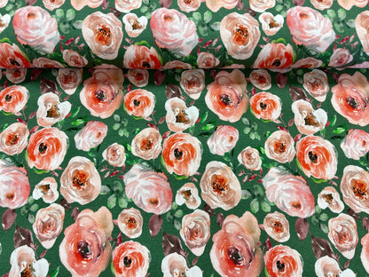 Jersey de coton fin - roses sur fond vert 200 g/m²