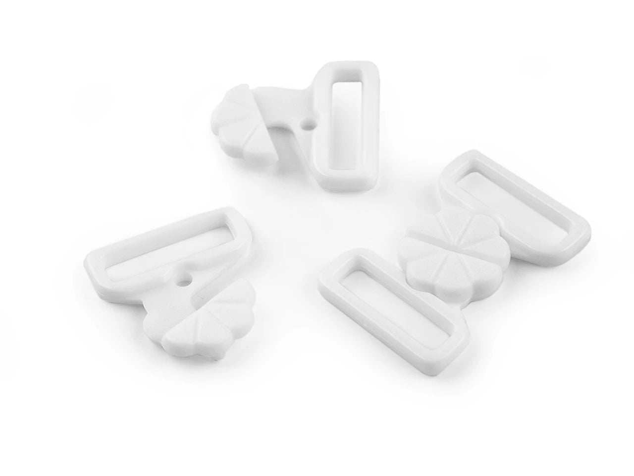 Attēls ar Plastmasas aizdare peldkostīmiem– 17 mm 5.pāri – pieejams Šarlotes audumi