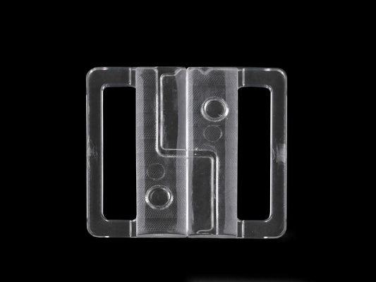 Paveikslėlis su plastikine užsegėle maudymosi kostiumėliams ir liemenėlėms, 30 mm – skaidri – galima įsigyti internetu Šarlotes audiniai
