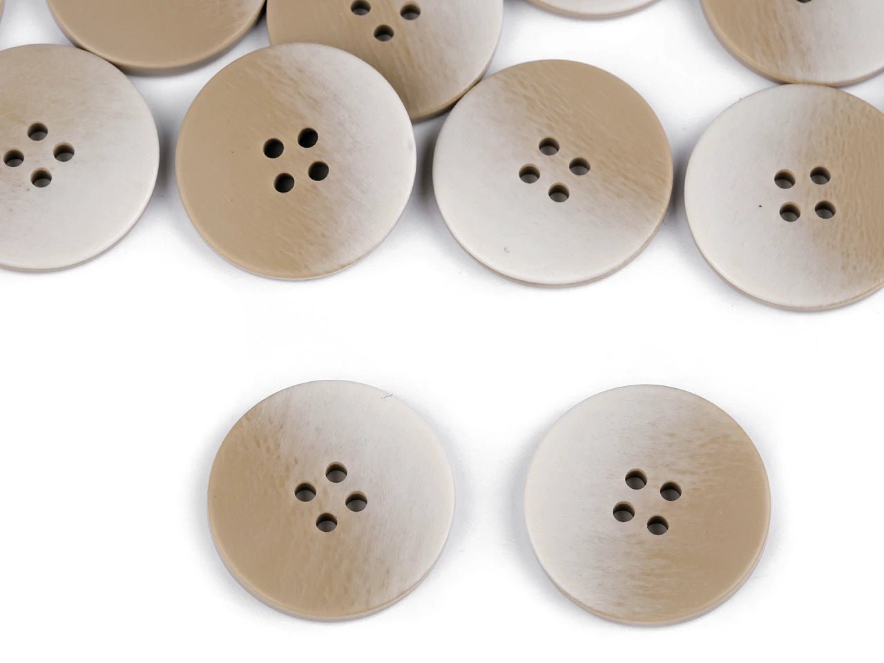 alt
Image of buttons with an ombre effect, elegant gradient design, Ø 21 mm - 28 mm – available at Šarlotes audumi