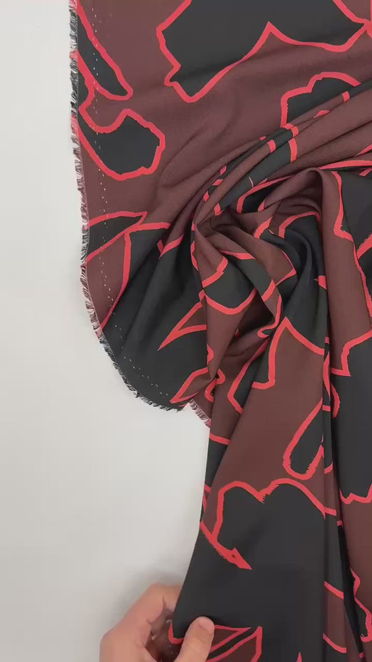 Itāļu elastīgs audums ar abstraktu rakstu | Poliesters 98% Elastāns 2% | 148 cm | Brūns & Melns | Neliels defekts