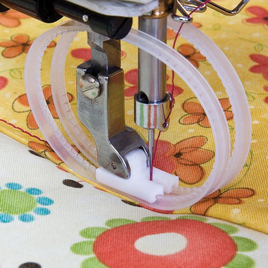 Image with industrial sewing machine presser foot - PTFE, Teflon with rings for thick and slippery materials – available at Charlotte Fabrics