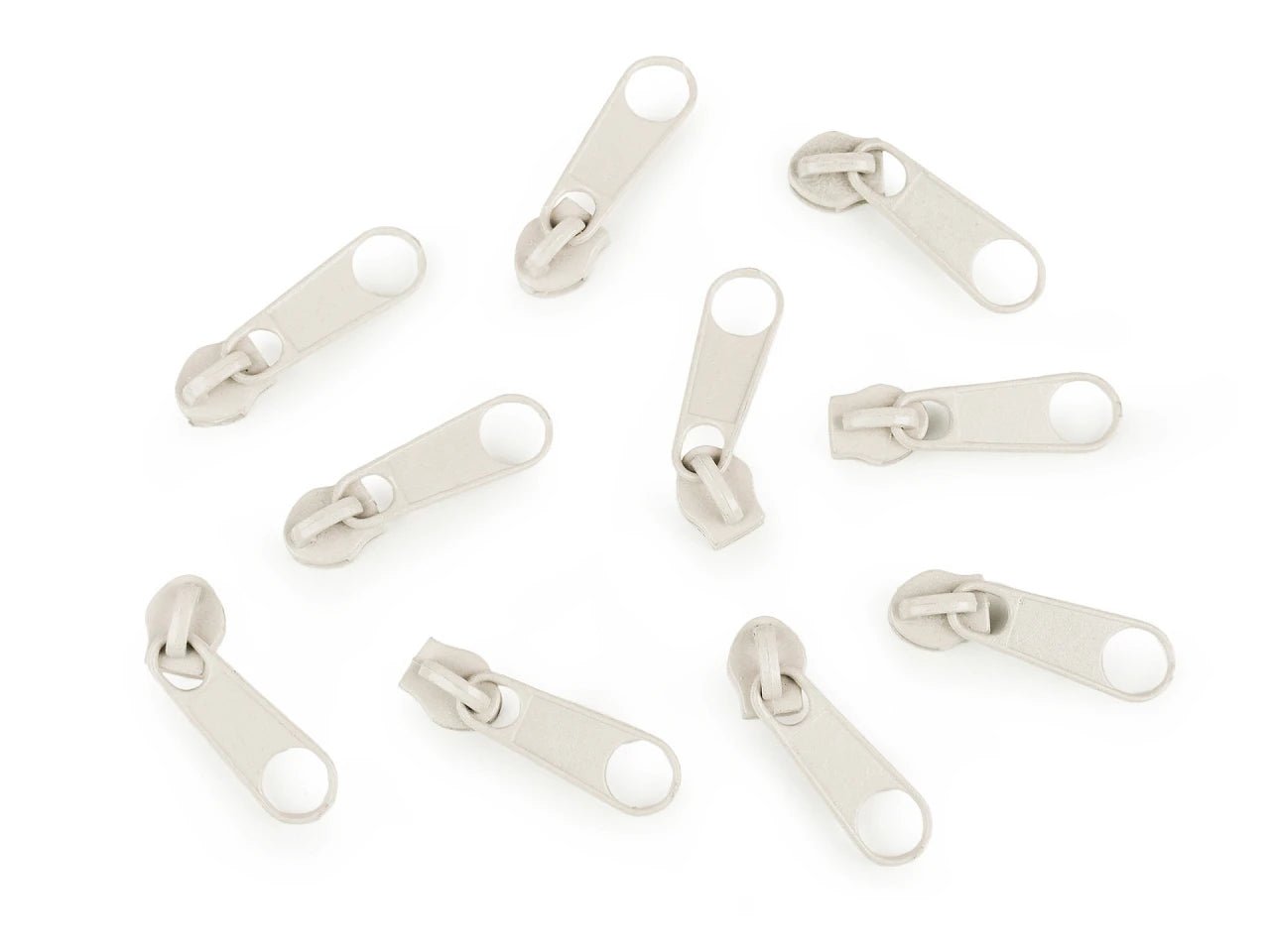 Attēls ar Slīdnis, kugītis spirālveida rāvējslēdzējam Nr.3|dažādu toņu – pieejams Šarlotes audumi