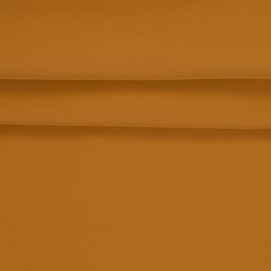 Image with waterproof softshell fabric - ochre yellow, available online at Charlotte's Fabrics