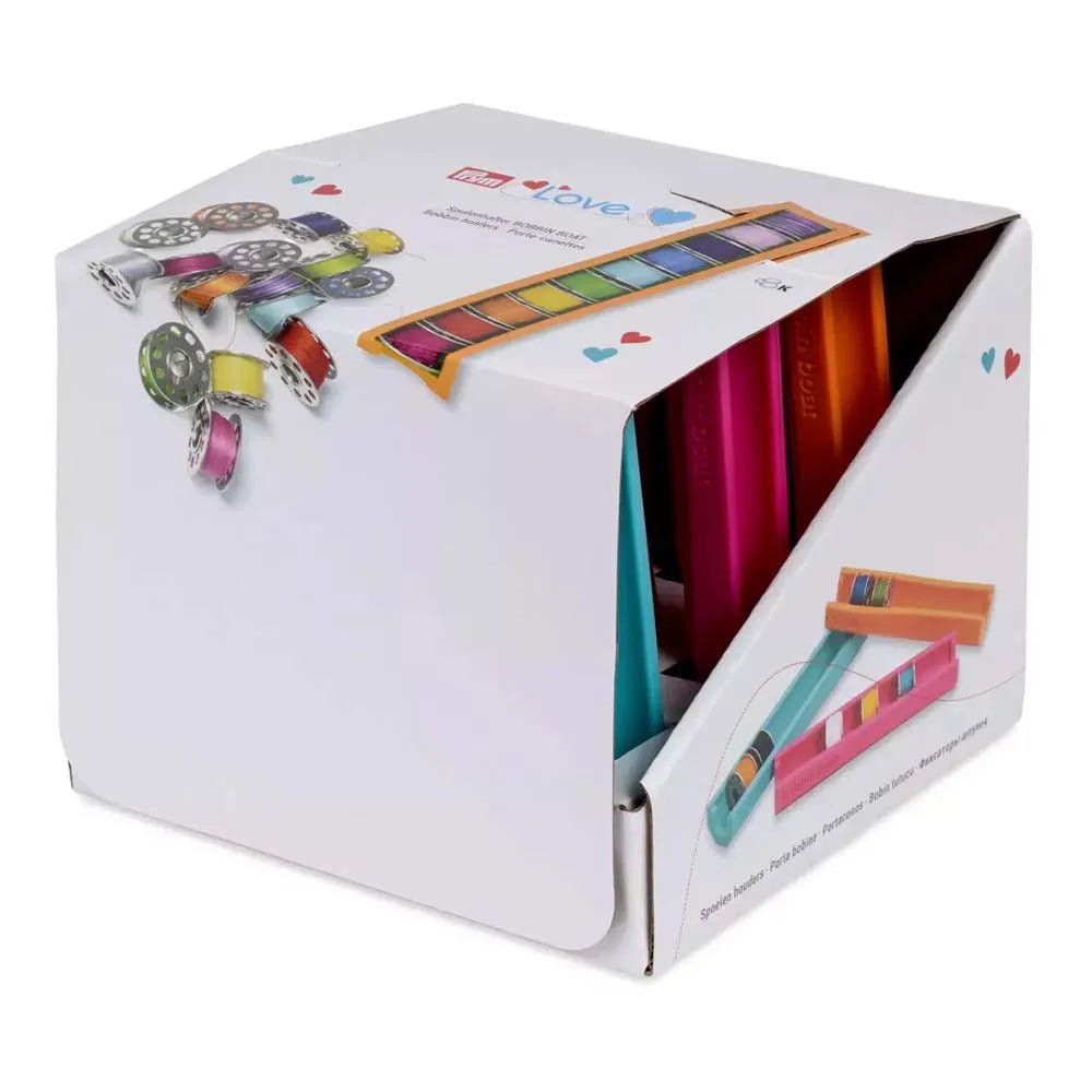 Attēls ar Spolīšu turētājs PRYM – ērts palīgs uzglabāšanai – pieejams Šarlotes audumi