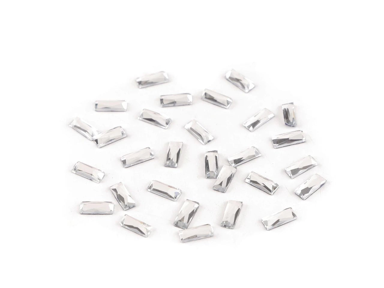 Attēls ar Termo kristāli dekorēšanai 3 × 7 mm 2g – pieejams Šarlotes audumi