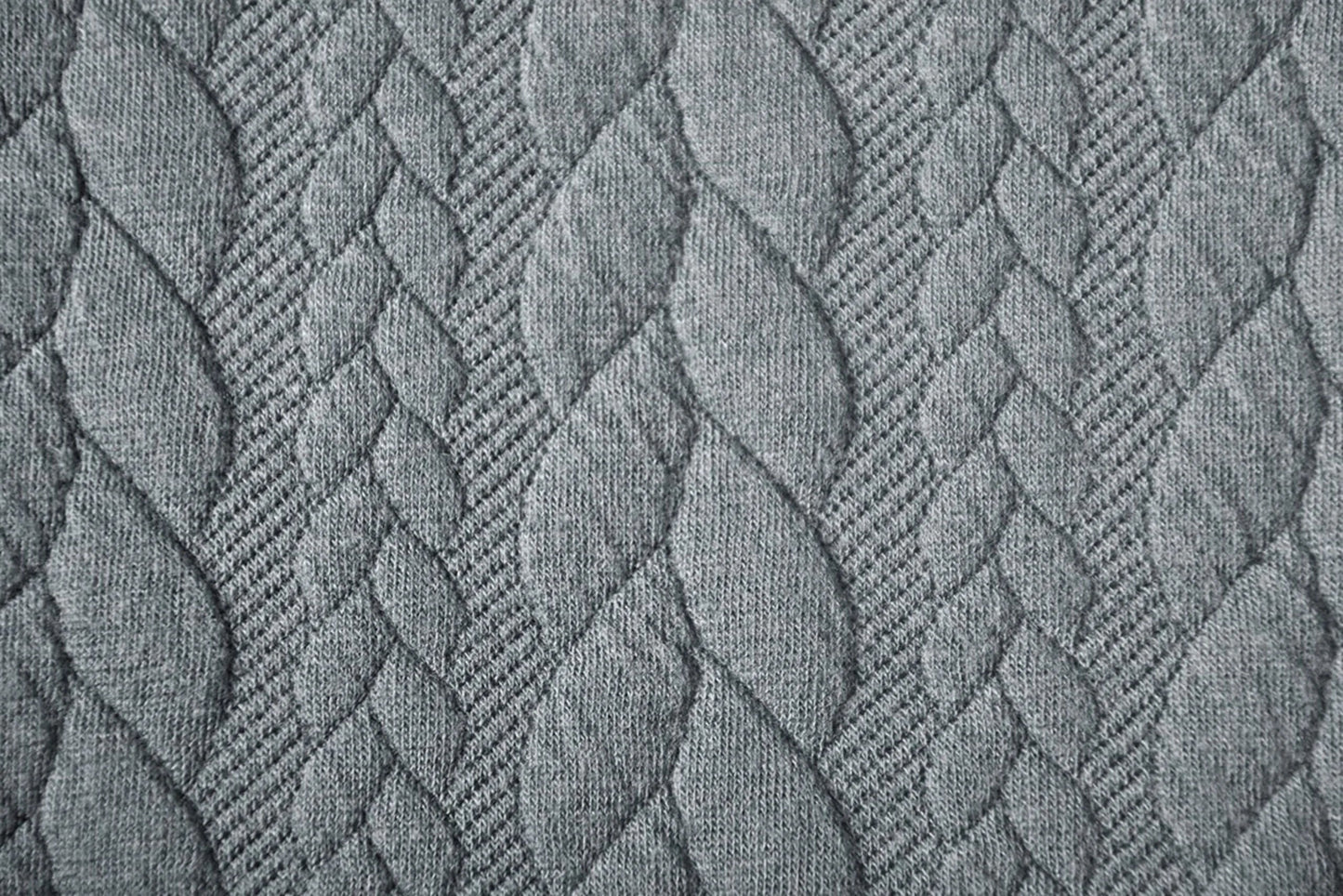 Attēls ar Trikotāžas audums ar adījuma rakstu - pelēkas pīnes 340 g/m² – pieejams Šarlotes audumi