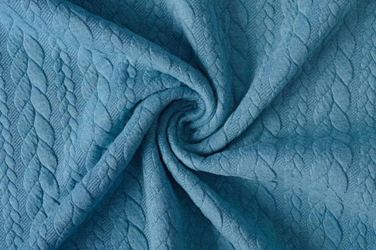 Attēls ar Trikotāžas audums ar adījuma rakstu - zilas pīnes 340 g/m² – pieejams Šarlotes audumi