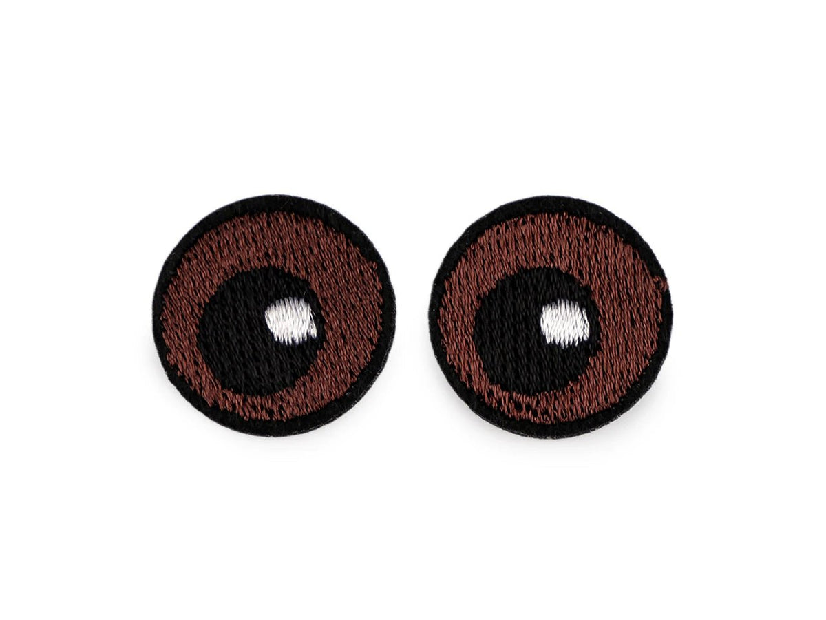 Image with iron-on Eyes patch Ø 2.2 cm – embroidered fabric patch, 10 pcs. – available online at Charlotte's Fabrics