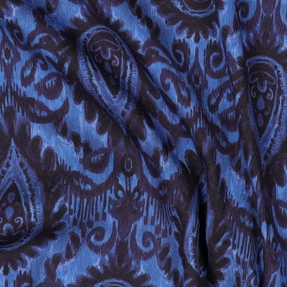 Vaizdas su viskoziniu audiniu su elastanu – mėlynas abstraktus raštas – galima įsigyti internetu Šarlotes audumi