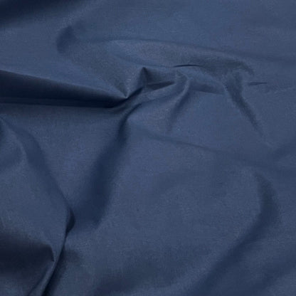 Tissu 100 % coton bleu fumé 220 cm 146 g/m²