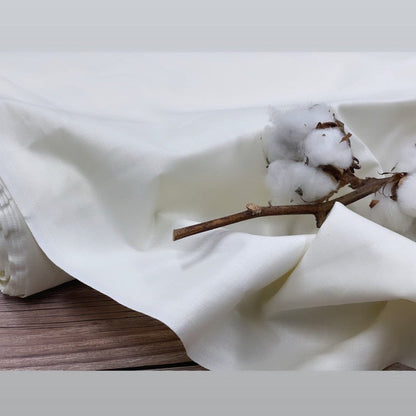 Tissu 100 % coton blanc lait 125 g/m²