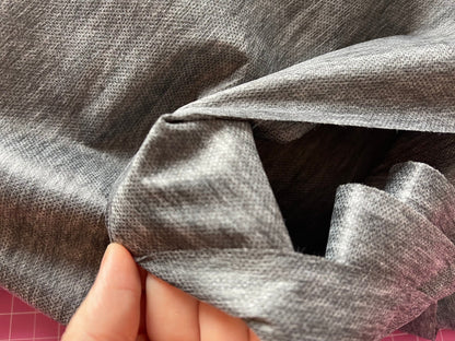 Entoilage thermocollant unilatéral (non-tissé) gris 34 g/m²