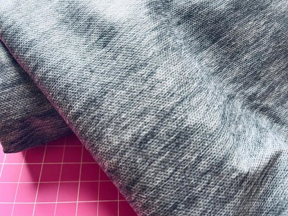 Tissu adhésif simple face (entoilage non tissé) gris 34 g/m²