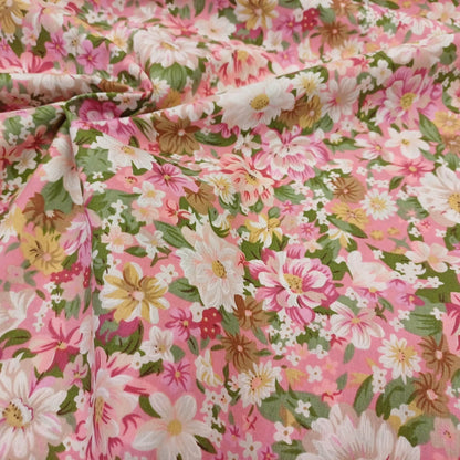 Premium 100 % tissu en coton - fleurs d'été sur fond rose 115 g/m²